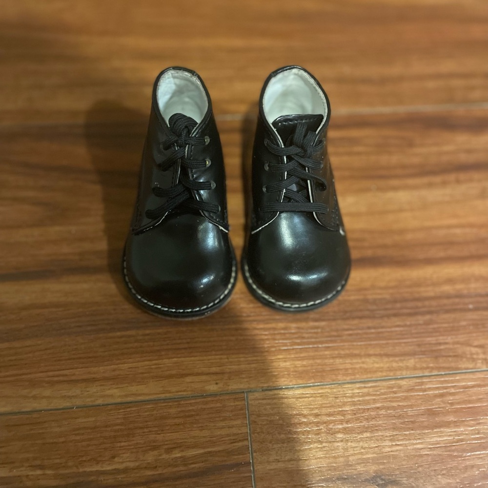 Black walking shoes. Hard bottom sole